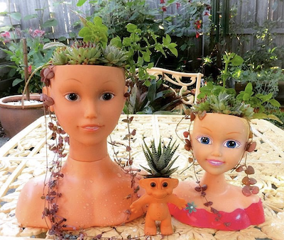 Tendance: transformer des têtes de poupées en jardinières (Photos